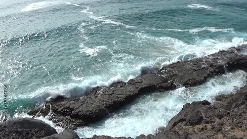 Waves crashing on rocks in Fuerteventura island, Canary