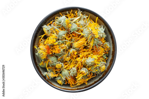 Healthy calendula flowers. Bowl of dry marigold petals, isolated on white. Herbal medicine.
