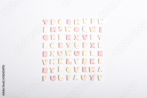 Cute pastel colours of lettering candy knolling photography front square