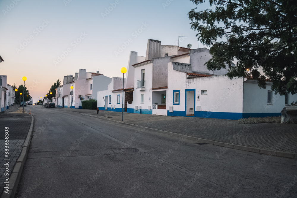 evening street with beautiful white houses. houses in portugal
