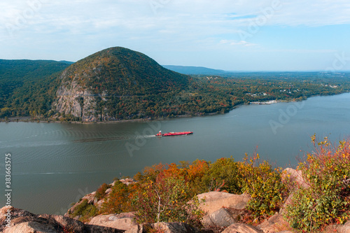 View from the Breakneck Ridge hiking trail near Cold Spring, New York, can see Storm King mountain and a cargo ship on the Hudson River photo