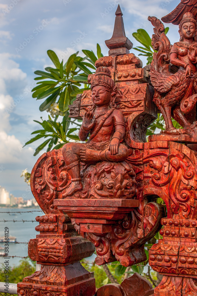 Fototapeta premium Pattaya City, Bang Lamung District/ Thailand- November 23, 2013: Wooden artworks at the viewing point in Pattaya