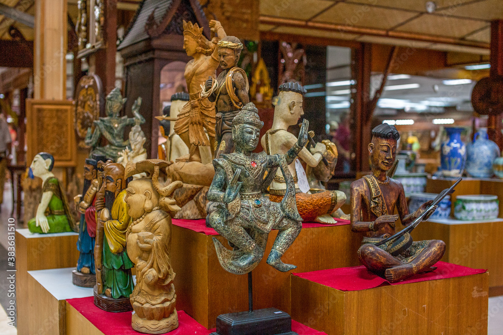Pattaya City, Bang Lamung District/ Thailand- November 25, 2013: Handmade wooden artworks in the shop of Pattaya Pattaya City, Bang Lamung District/ Thailand- November 25, 2013: Handmade wooden artworks in the shop of Pattaya