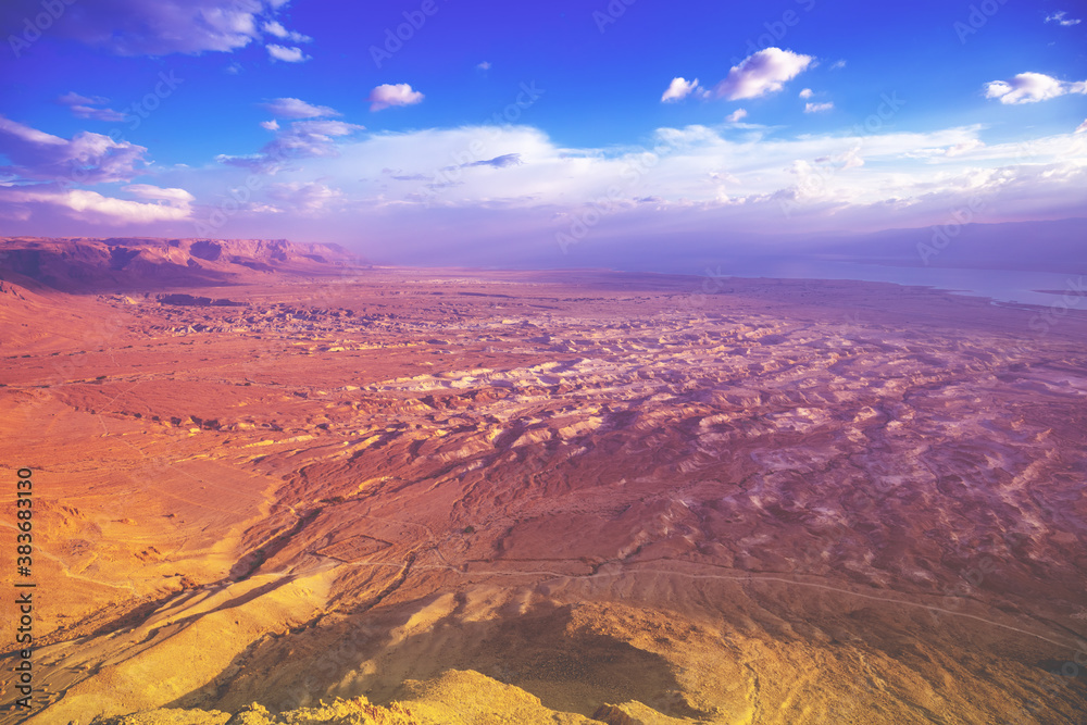 Beautiful purple sunrise over the Dead sea region from Masada fortress in the Judaean Desert
