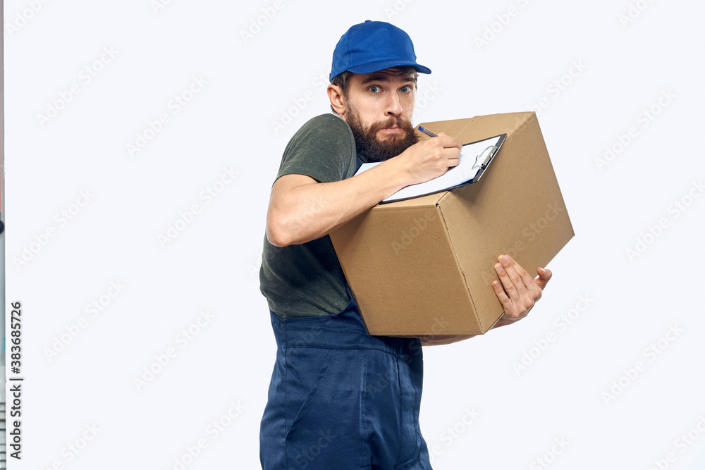 Working male courier with box in hand documents delivery service light background Working male courier with box in hand documents delivery service light background