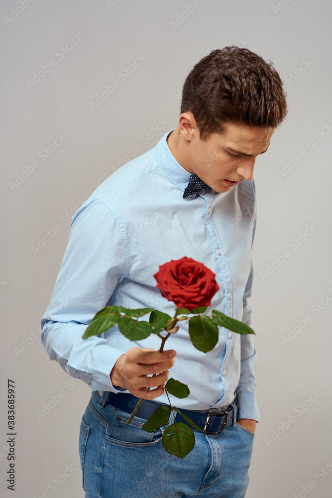 romantic man with red rose and light shirt pants suit romantic man with red rose and light shirt pants suit