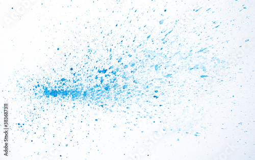 blue watercolor spatter background on white paper photo