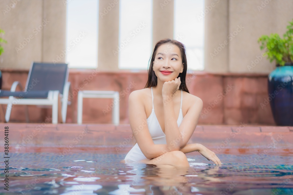 Portrait beautiful young asian woman relax smile leisure around outdoor swimming pool Portrait beautiful young asian woman relax smile leisure around outdoor swimming pool