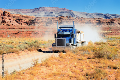 Semi-truck driving across the desert