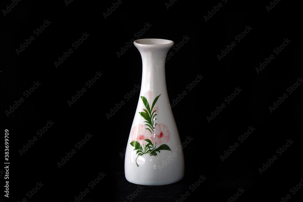 Traditional Japanese Sake liquor vase on black background Traditional Japanese Sake liquor vase on black background