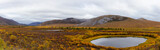 Beautiful Panoramic View of Scenic Lake on a Fall Day in Canadian Nature. Taken near Tombstone Territorial Park, Yukon, Canada.