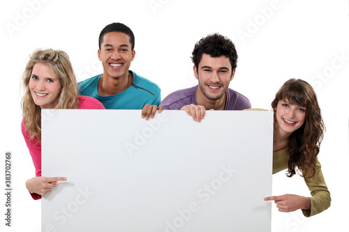 Photography happy foursome showing copyspace