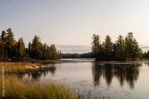 Autumnal view of a peaceful lake in the Frontenac national park, Canada