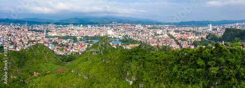 Aerial landscape: Ancient wall of The Mac dynasty as known as Northern Mac or House of Mac, old ruins located on a mountain with panoramic city Lang Son backwards, Vietnam. © CravenA
