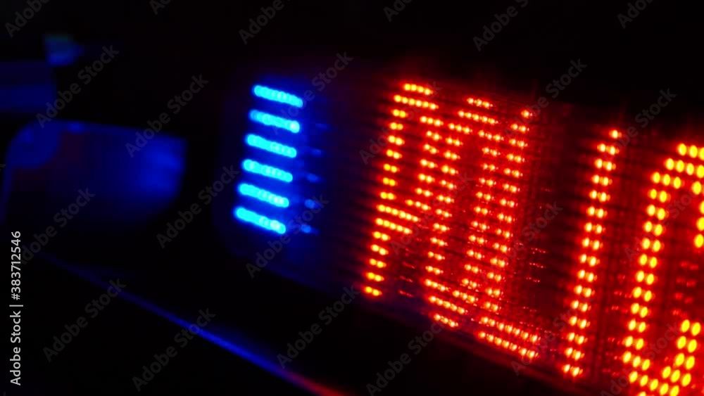 Red Police Sign And Blue LED Lights Behind Car Windscreen. Dolly Back, Slow Motion