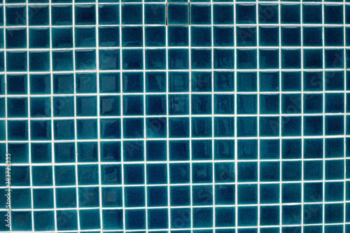 Blue tiles on the wall for background.