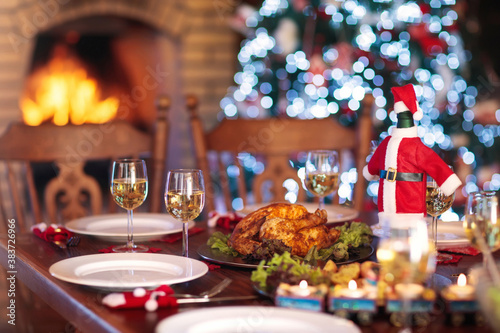 Christmas dinner at fire place and Xmas tree.