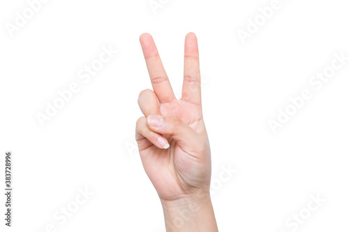 Gesture of the hand concept showing peace sign or victory and v sign isolated on white background.