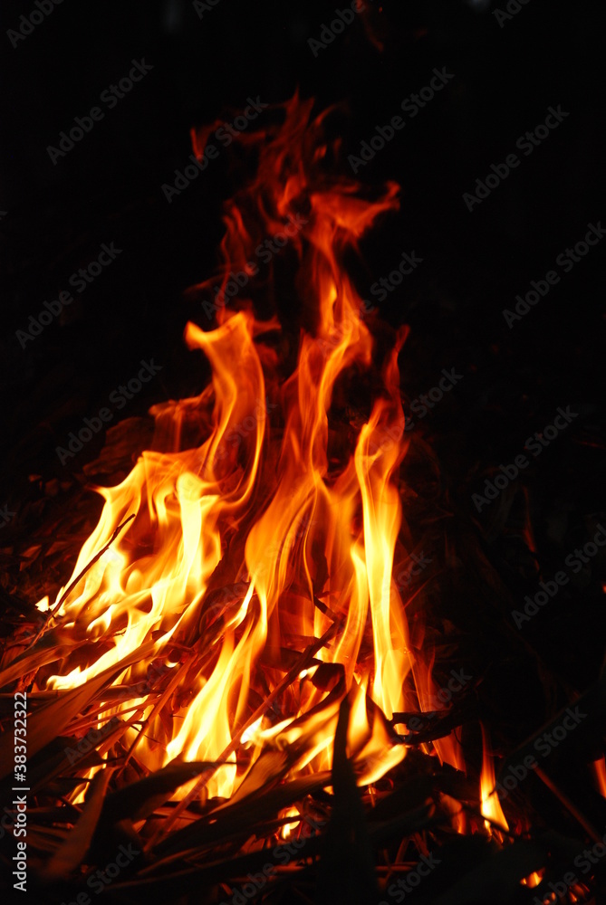 fire was burning in the dark