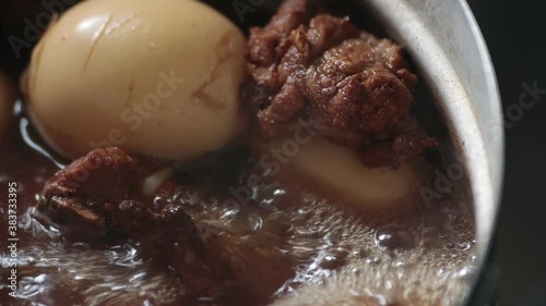 Thai Food Pork and Boiled Eggs in Sweet Brown Sauce or Thai Stewed on Left Frame