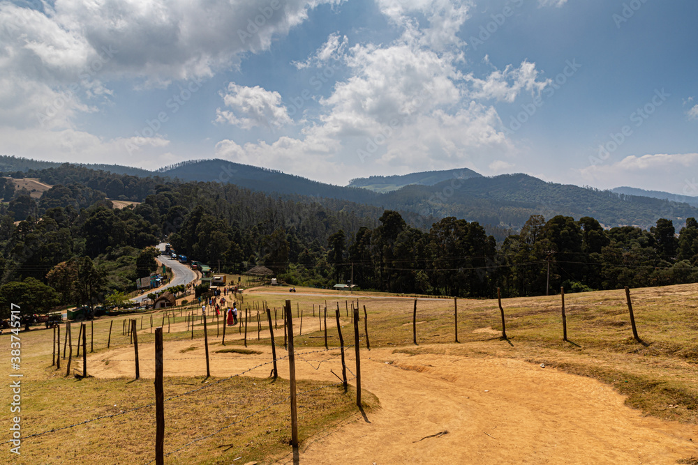 Fototapeta premium Tourists walking Pykara shooting point