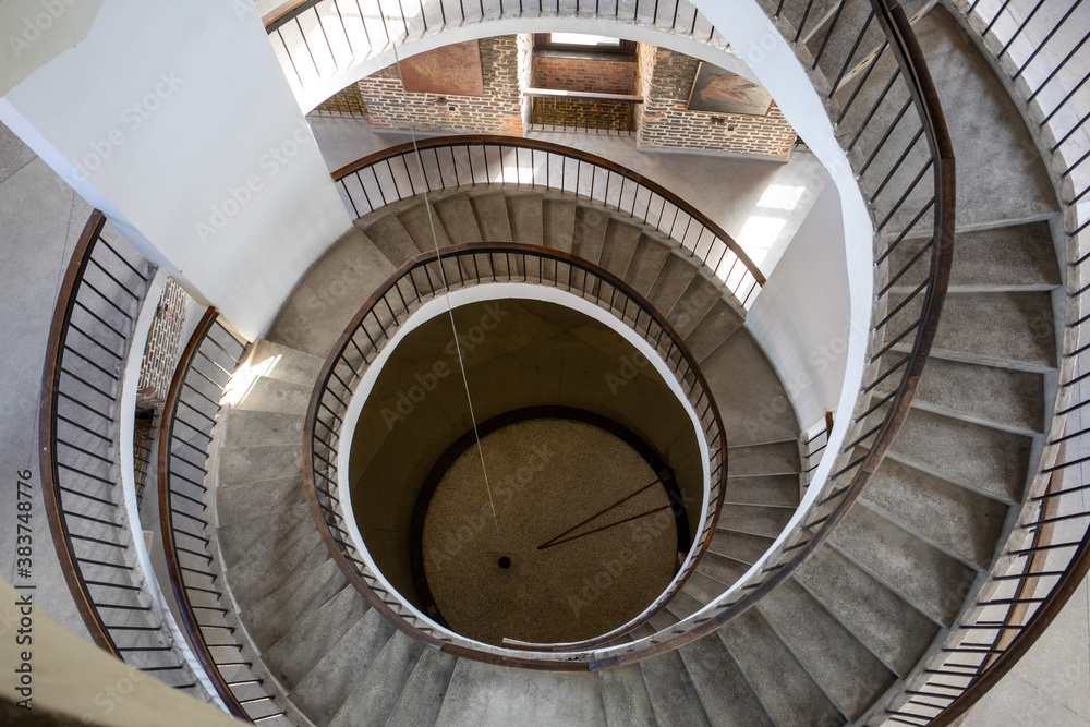 Stairs and Foucault's Pendulum suspended within the belfry or Radziejowski Tower on Cathedral Hill, Frombork. Poland