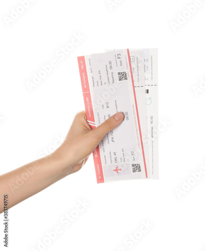 Female hand with tickets on...