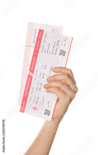 Female hand with tickets on...