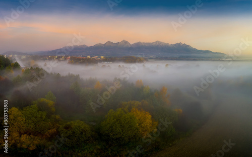 beautiful landscape with valleys, mountains in High Tatras in fog © Jaro