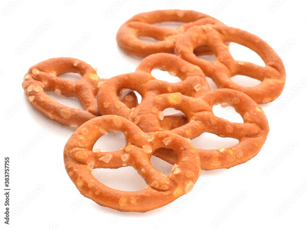 Pretzel salted bavarian bread closed up isolated on white Pretzel salted bavarian bread closed up isolated on white
