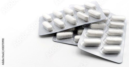 Photos Some paracetamol blisters isolated on white background