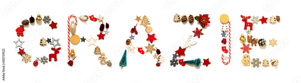 Colorful Christmas Decoration Letter Building Italian Word Grazie Means Thank You. Festive Ornament Like Christmas Tree, Star And Ball. White Isolated Background