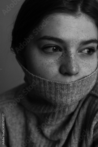 Black and white portraits of cute girl with freckles