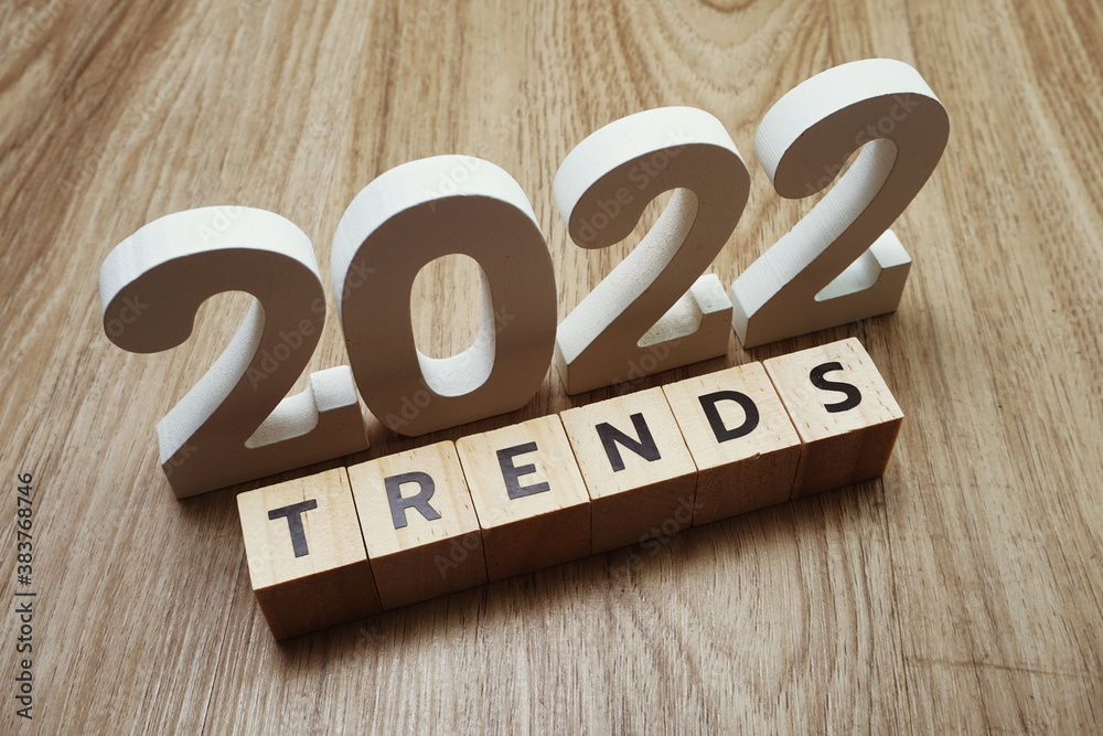 Trends 2022 word alphabet letters on wooden background Trends 2022 word alphabet letters on wooden background