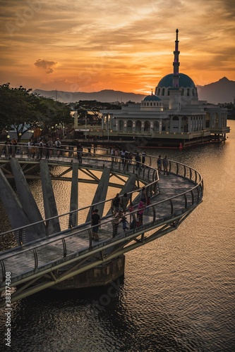 The floating mosque of Kuching and The Darul Hana Bridge during sunset