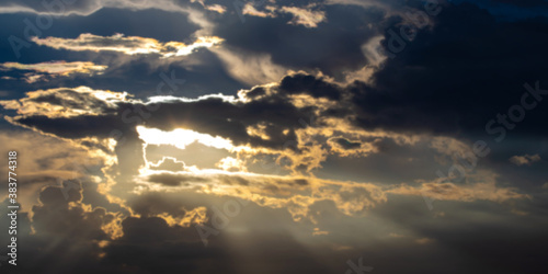 blurred sky dark, sky and sunlight beam for background, dramatic sky with sunbeam © cgdeaw
