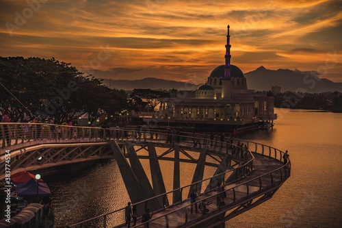 The floating mosque of Kuching and The Darul Hana Bridge during sunset © MuhammadFadhli