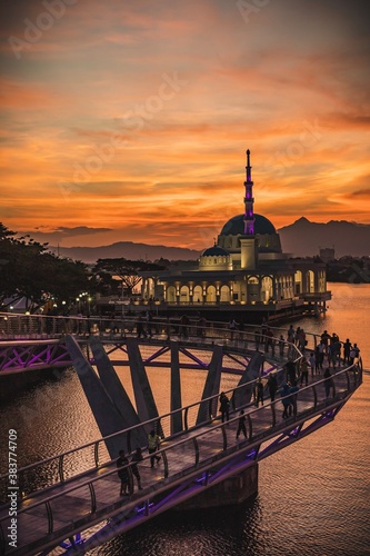 The floating mosque of Kuching and The Darul Hana Bridge during sunset