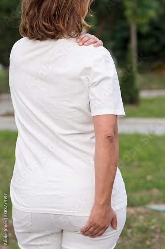 A woman practicing Jin Shin Jyutsu, a japanese self-helping therapy