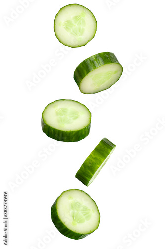 Falling cucumber slices isolated on a white background with clipping path. Flying vegetables