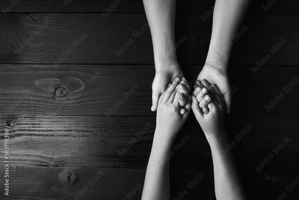 arms stretches out and holds one another arms stretches out and holds one another