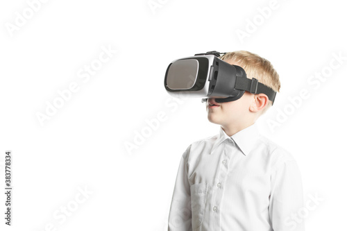 child in virtual reality mask on white background © alexxndr