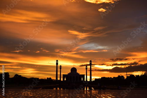 Sunset view with red clouds, golden yellow, colorful sky at the Central Mosque, Songkhla Province.