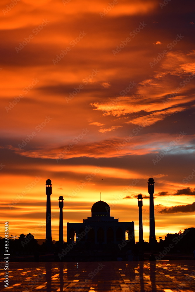 Sunset view with beautiful golden sky At Masjid in the middle of Songkhla Province, the colorful sky lights in the evening