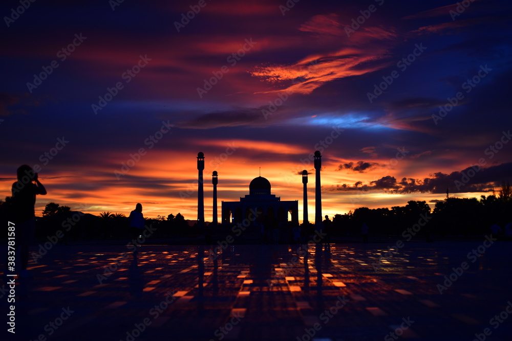 Sunset view with beautiful golden sky At Masjid in the middle of Songkhla Province, the colorful sky lights in the evening Sunset view with beautiful golden sky At Masjid in the middle of Songkhla Province, the colorful sky lights in the evening