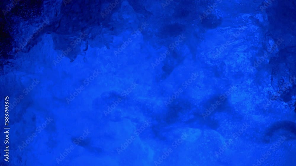 Splashing blue water caustic in slow motion 180fps Splashing blue water caustic in slow motion 180fps