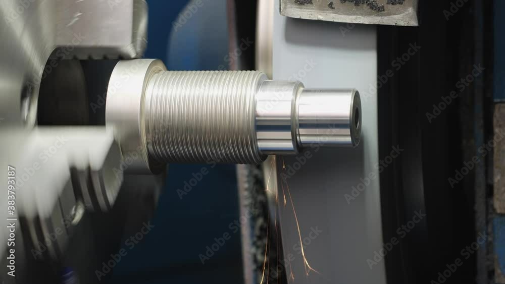 Turning bench industrial grinding machine works on steel workpiece casting sparks - static camera, close up Turning bench industrial grinding machine works on steel workpiece casting sparks - static camera, close up