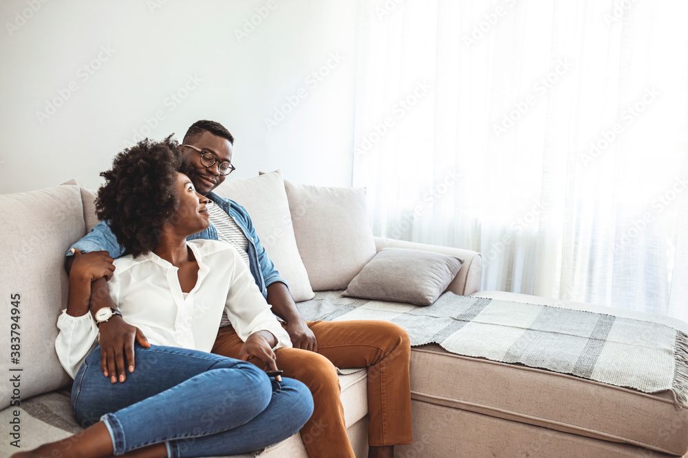 Young family couple together at home casual. Young woman and man family couple indoors relaxation. Being together is the best place to be. Shot of a young couple relaxing at home