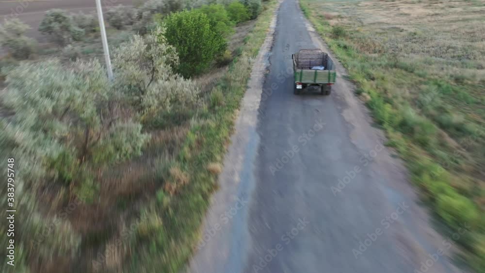 Aerial photography of the landscape in 4k. Old Soviet car. Soviet car in motion. ZIL. Aerial photography of the landscape in 4k. Old Soviet car. Soviet car in motion. ZIL.