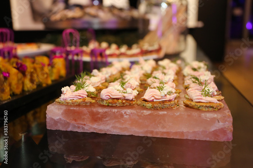 canapés servered on a Himalayan salt slab. photo